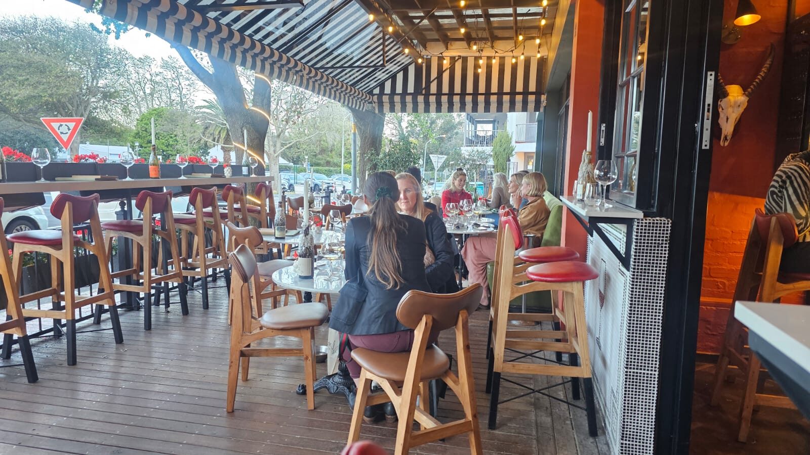 The sunny street-side deck at Culture Wine Bar, Newlands Village