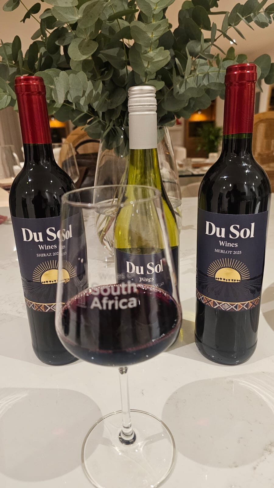 Du Sol red and white bottles standing together