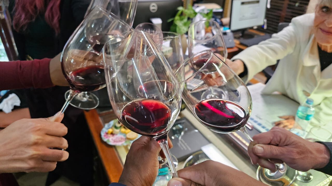 A toast shared over Du Sol wines