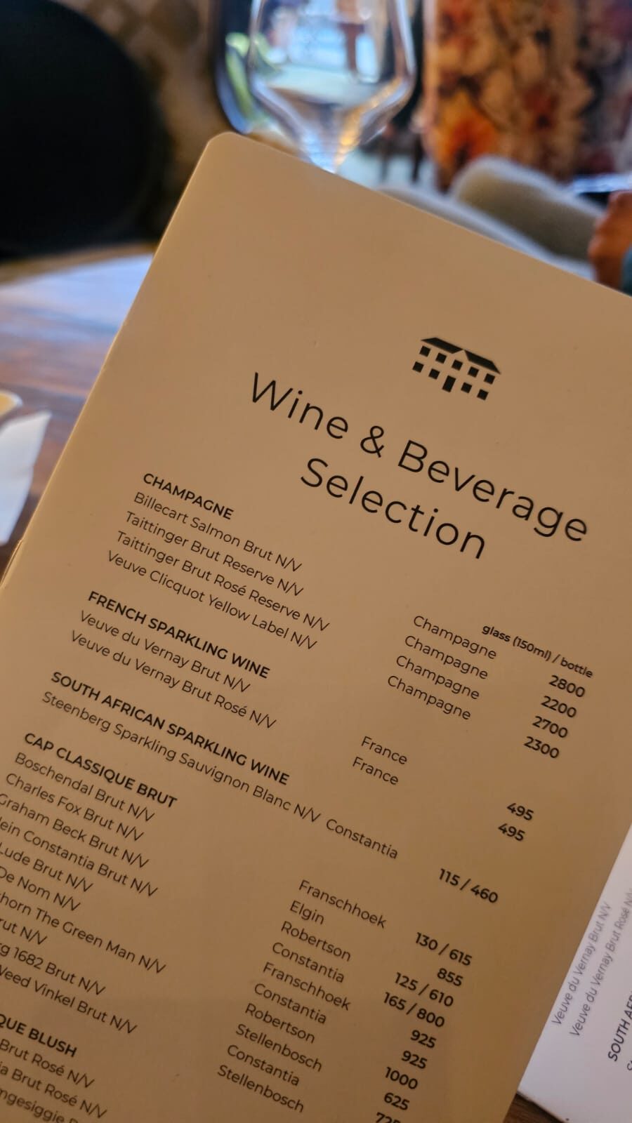 A Du Sol menu card presented at the table