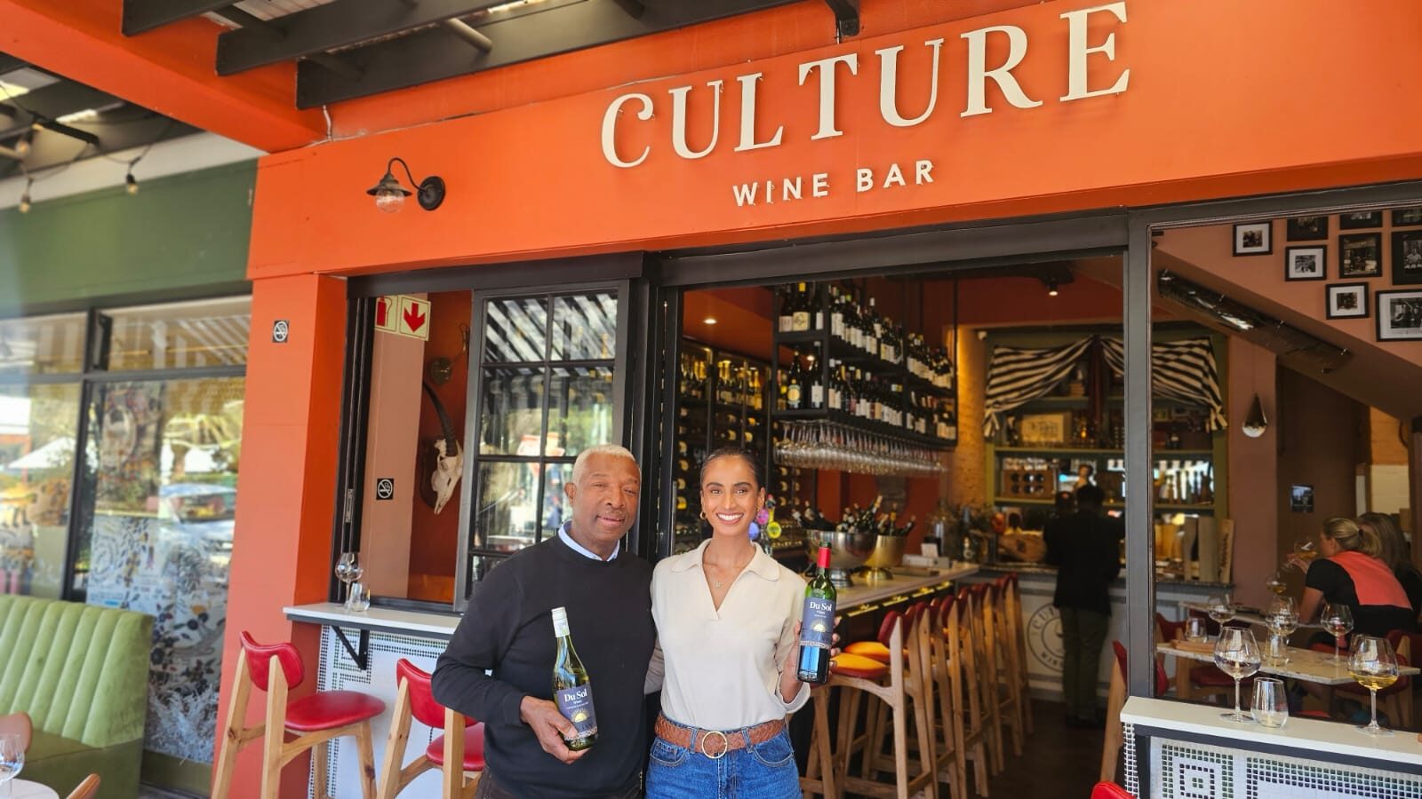 Solly and a guest with Du Sol wines outside Culture Wine Bar