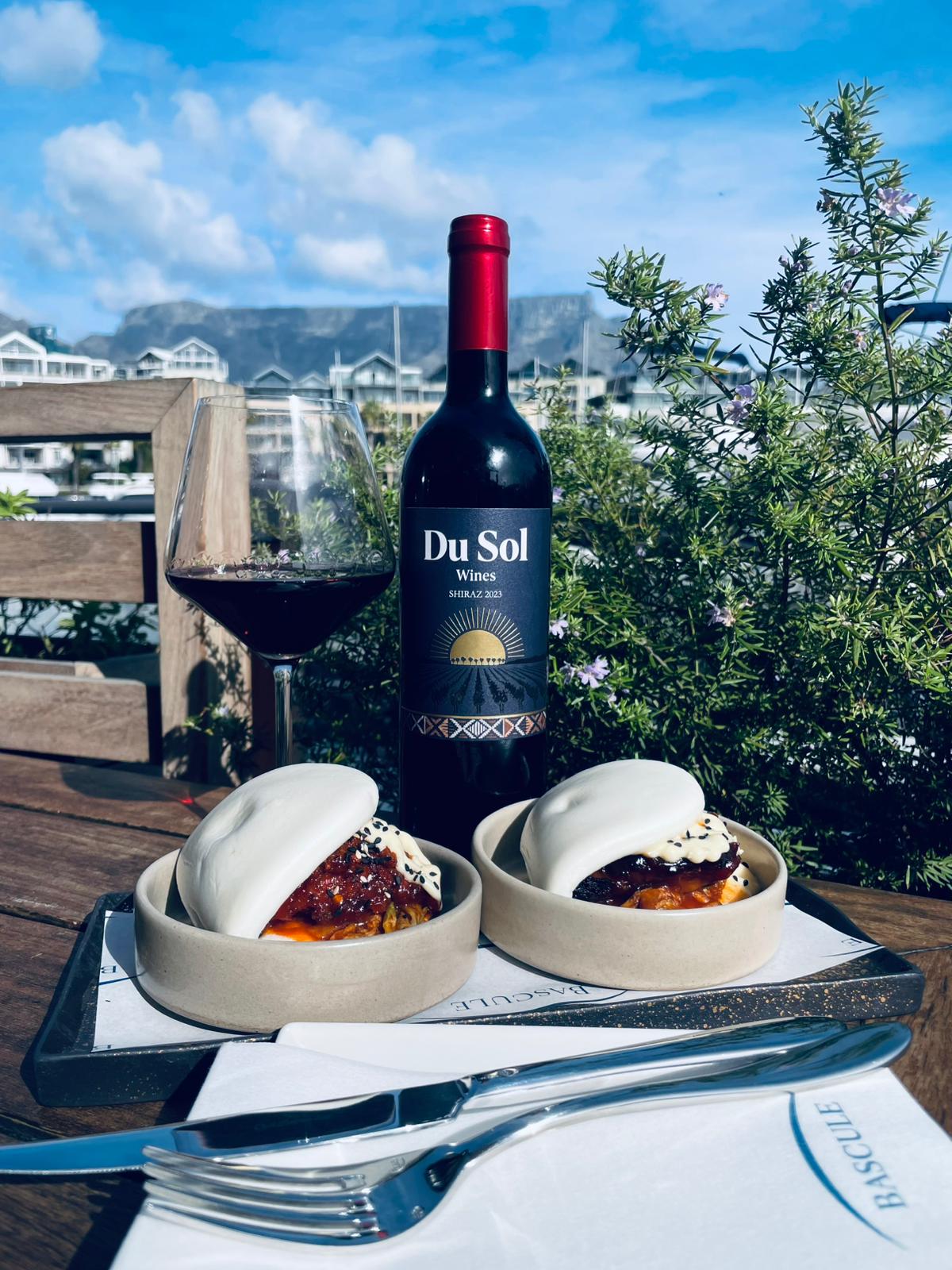Du Sol Shiraz and a glass of red with Table Mountain in the distance