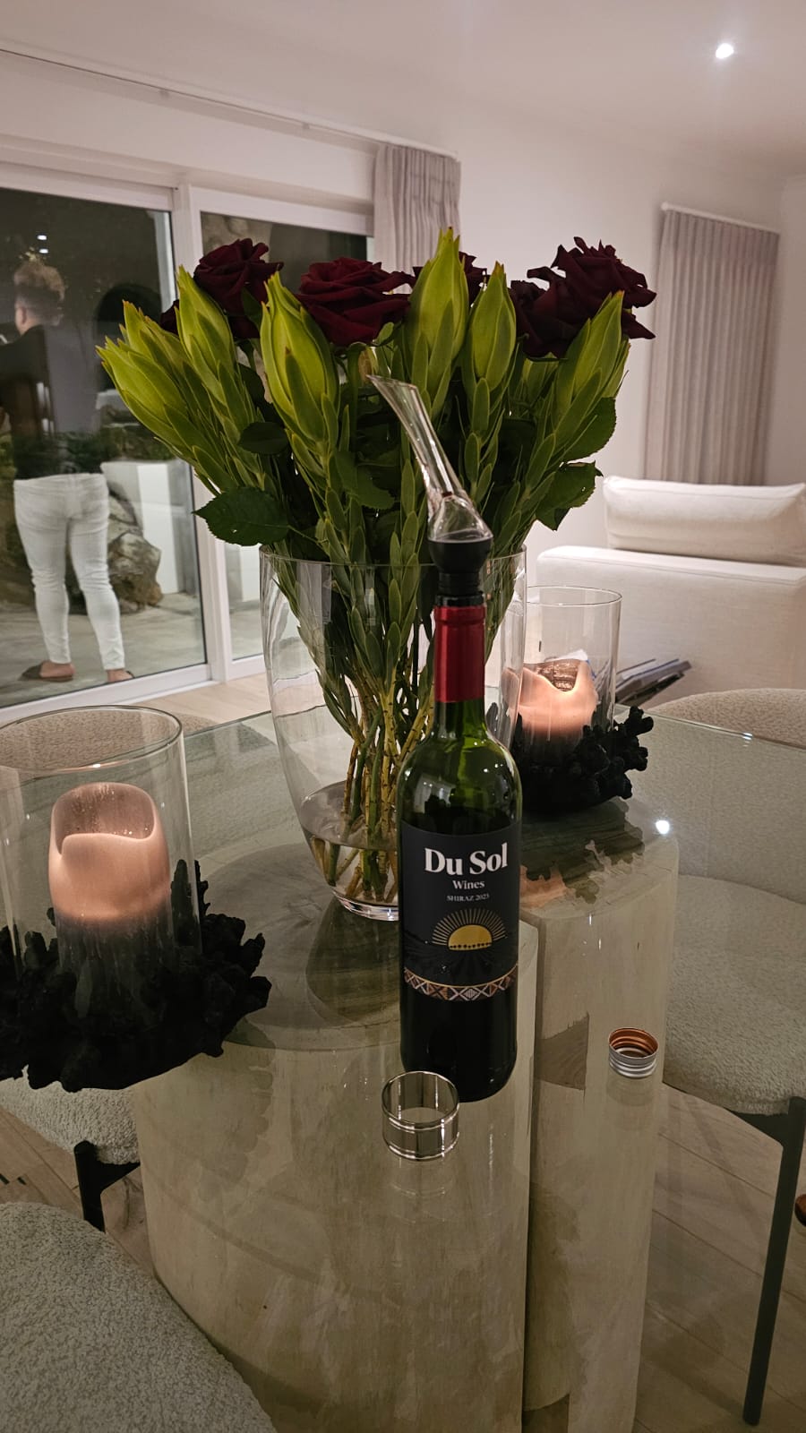 Shiraz with a bouquet of roses